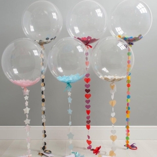 Шарик Bubble с перьями на бумажной гирлянде фото