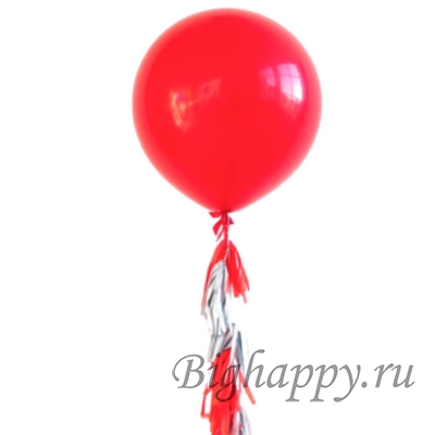 Большой шар красного цвета с гирляндой-тассел фото