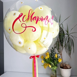 Большой прозрачный шар с нежно-желтыми шариками внутри фото