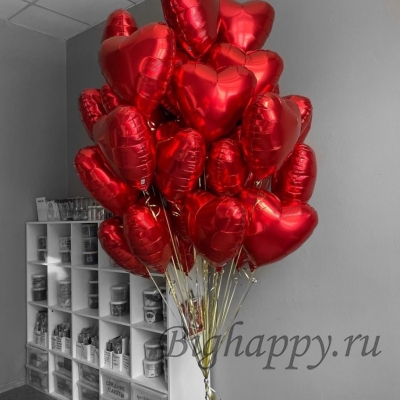 Роскошная связка 25 красных шаров в форме сердец фото