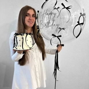 Большой прозрачный шар с надписью и бантиками «Чёрная магия» фото