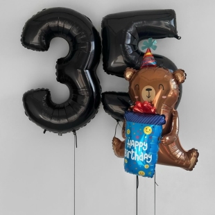 Композиция из воздушных шаров &laquo;Мишка с подарком&raquo; фото
